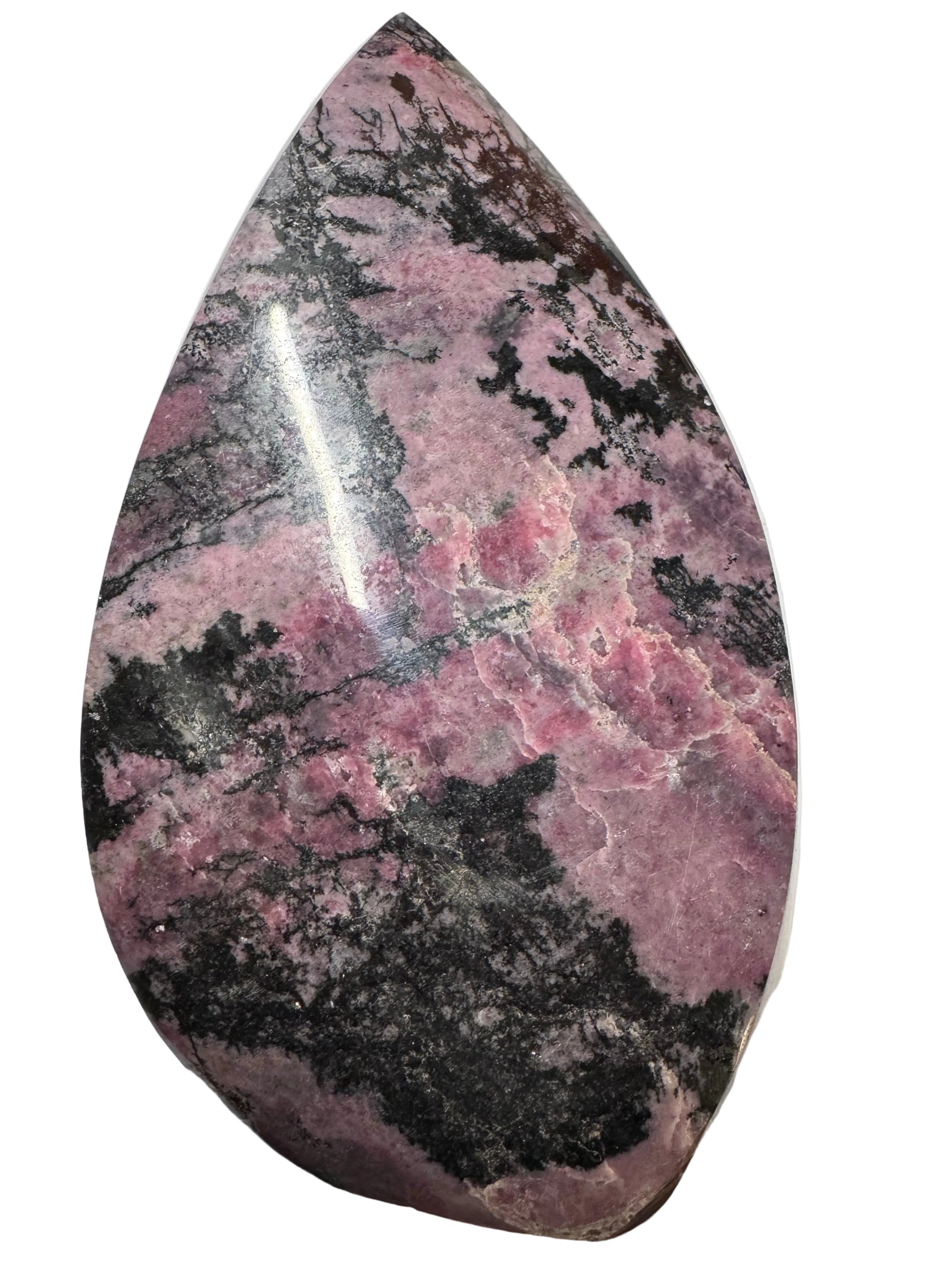Polished stone with pink and black patterns on a white background