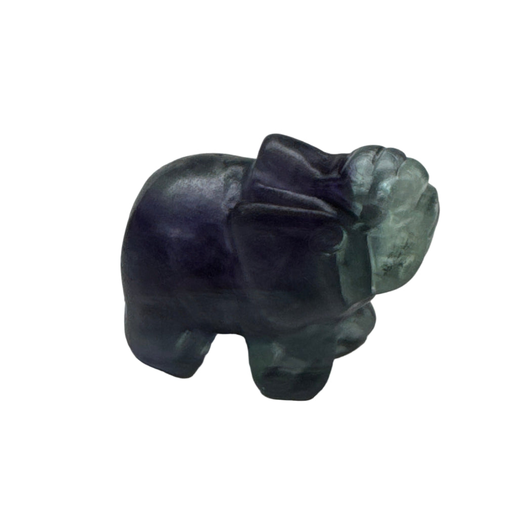 Carved stone figure on a white background