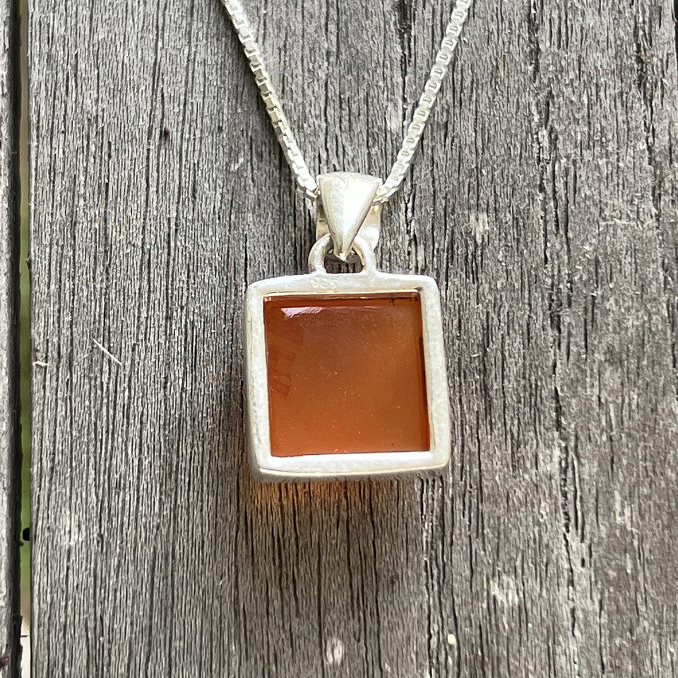 Carnelian is known as a stone of motivation and endurance, leadership and courage. Carnelians have protected and inspired throughout history. A glassy, translucent stone, Carnelian is an orange-colored variety of Chalcedony, a mineral of the Quartz family.