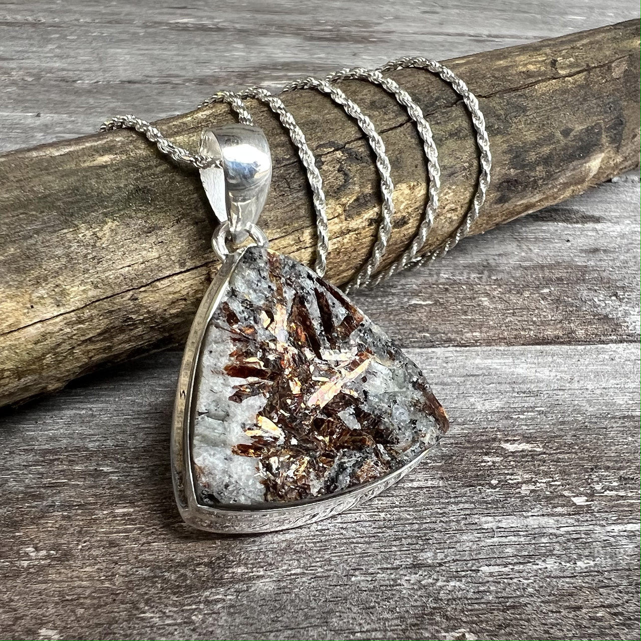 Astrophyllite is thought to compensate for our physical restrictions by expanding our spiritual perception of all things. It is a popular stone for those working on 'Astral Travel'. As Astrophyllite is a bridge for perception, it also activates the highest and lowest chakras, uniting each energy center along the way.