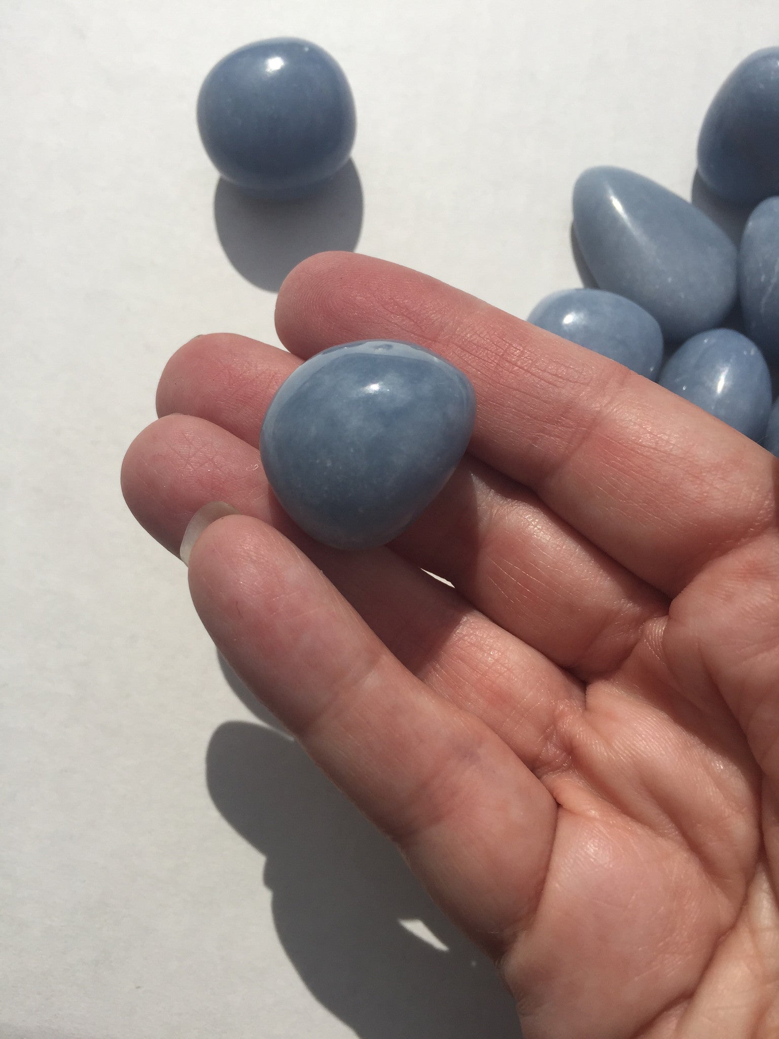 Angelite tumbled single gemstone - Cast a Stone