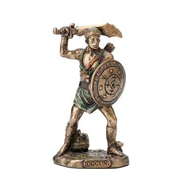 Statue of a warrior Oggun holding a sword and shield on a white background