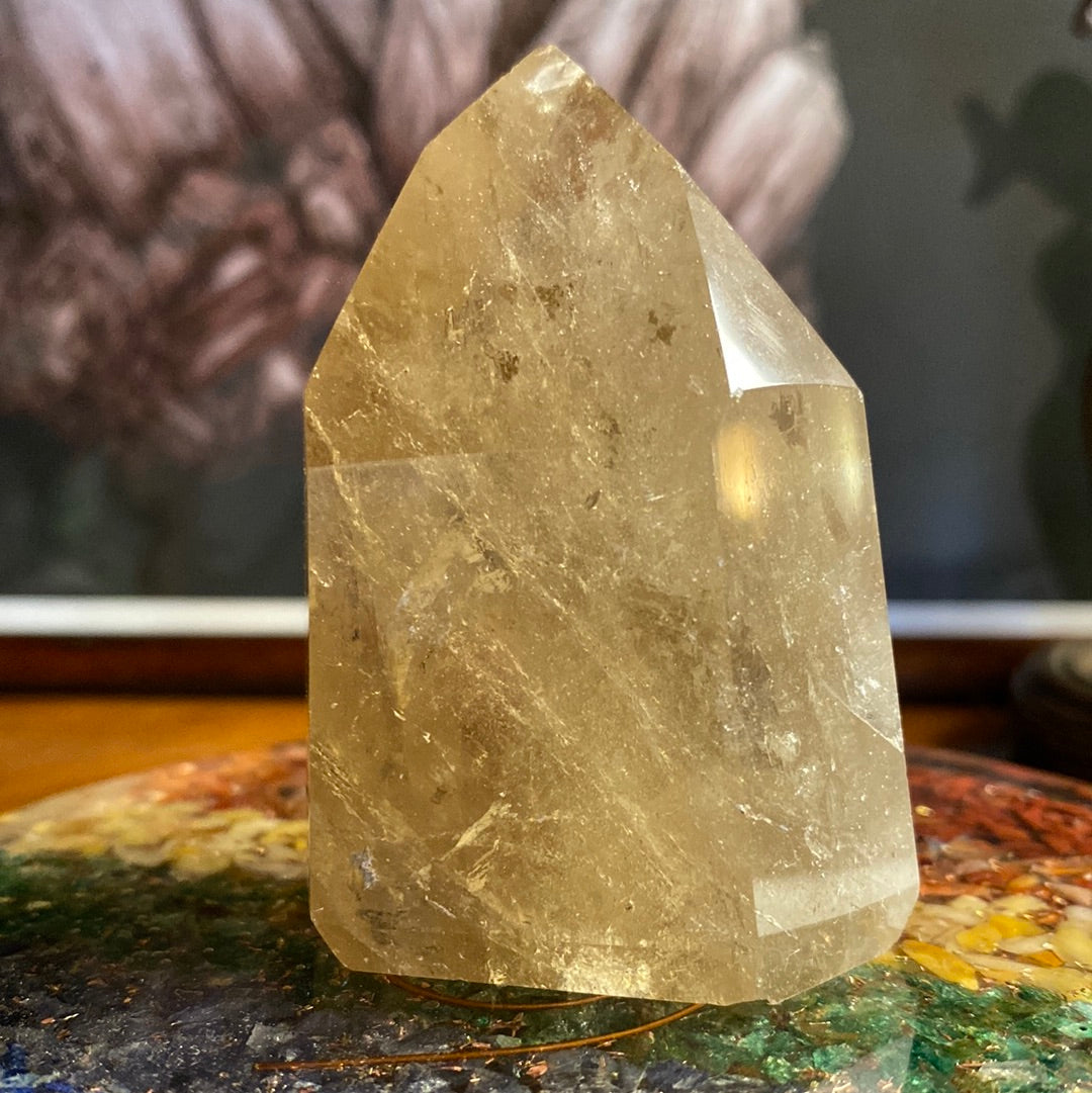 Polished Citrine Gemstone Point with natural inclusions visible
