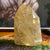 Polished Citrine Gemstone Point with natural inclusions visible