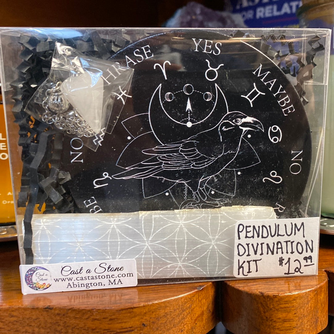 The Pendulum Divination Kit, including a pendulum, board, and Selenite stick for finding answers and guidance