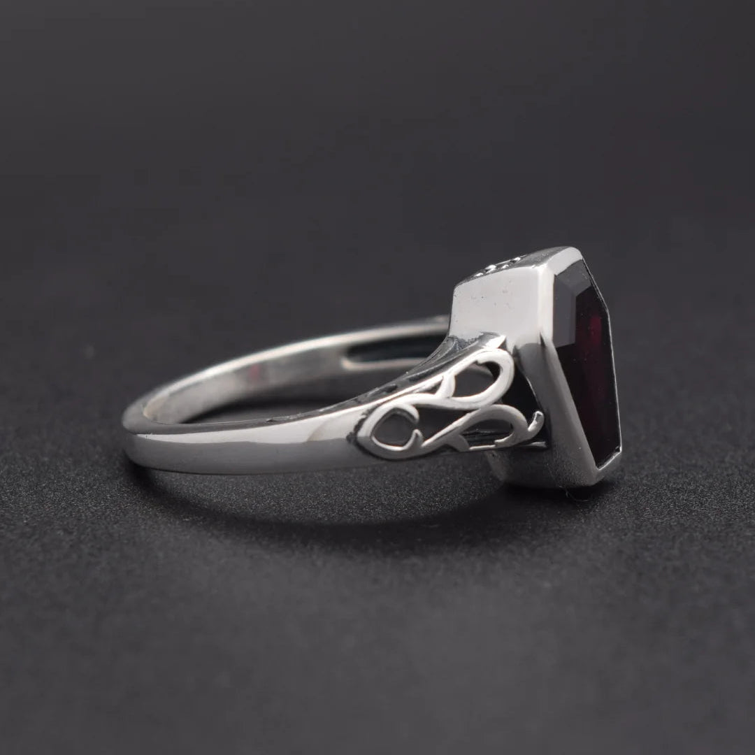 Silvaria sterling silver coffin ring with deep red garnet gemstone and sparkling zircon accents, gothic gemstone jewelry