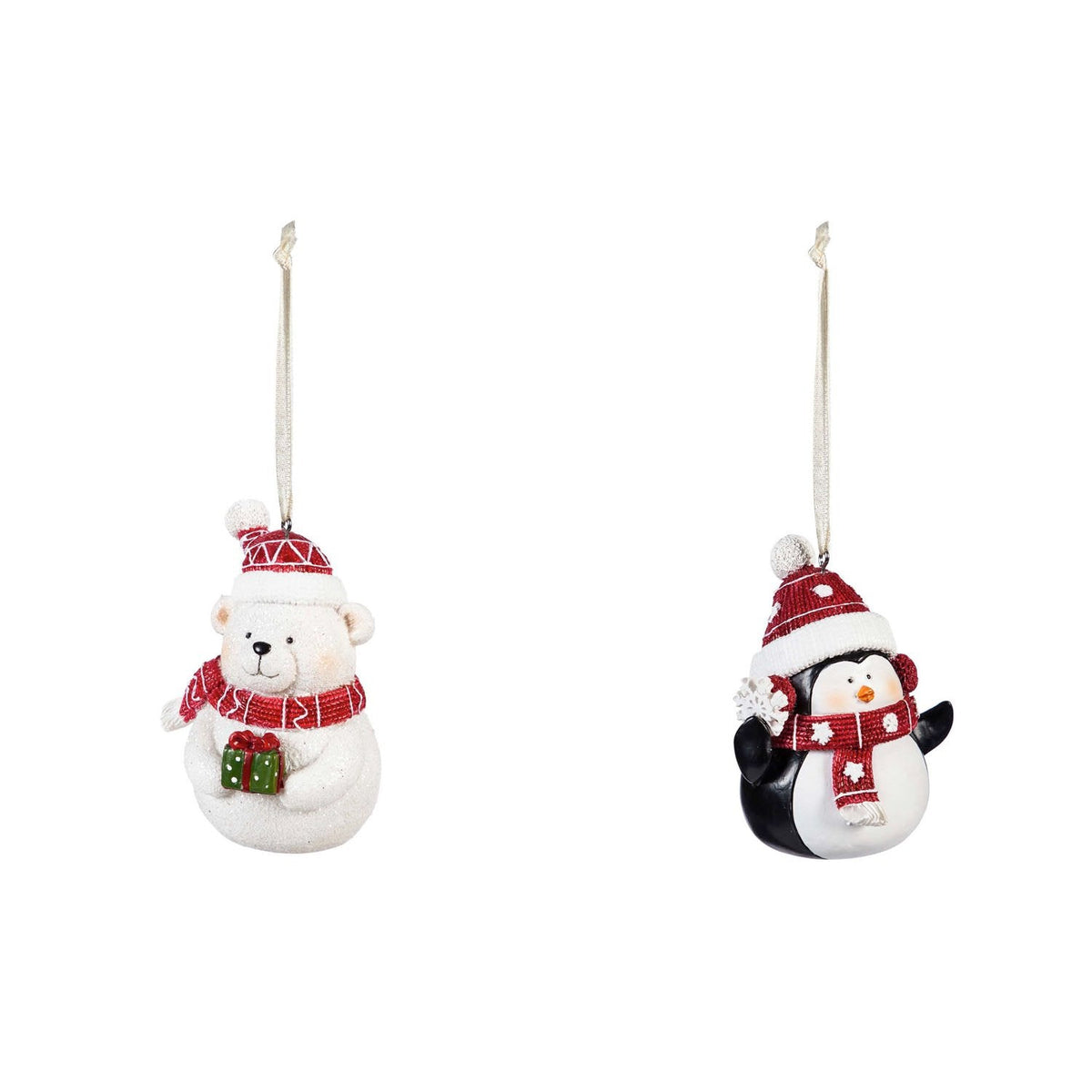 Two resin Christmas ornaments: a white polar bear holding a gift and a penguin holding a snowflake, both in red knit hats and scarves