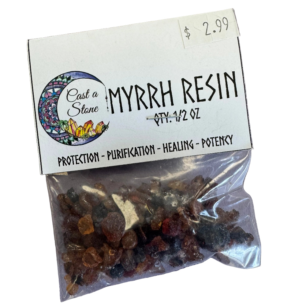Bag of myrrh resin with a label on a gray background