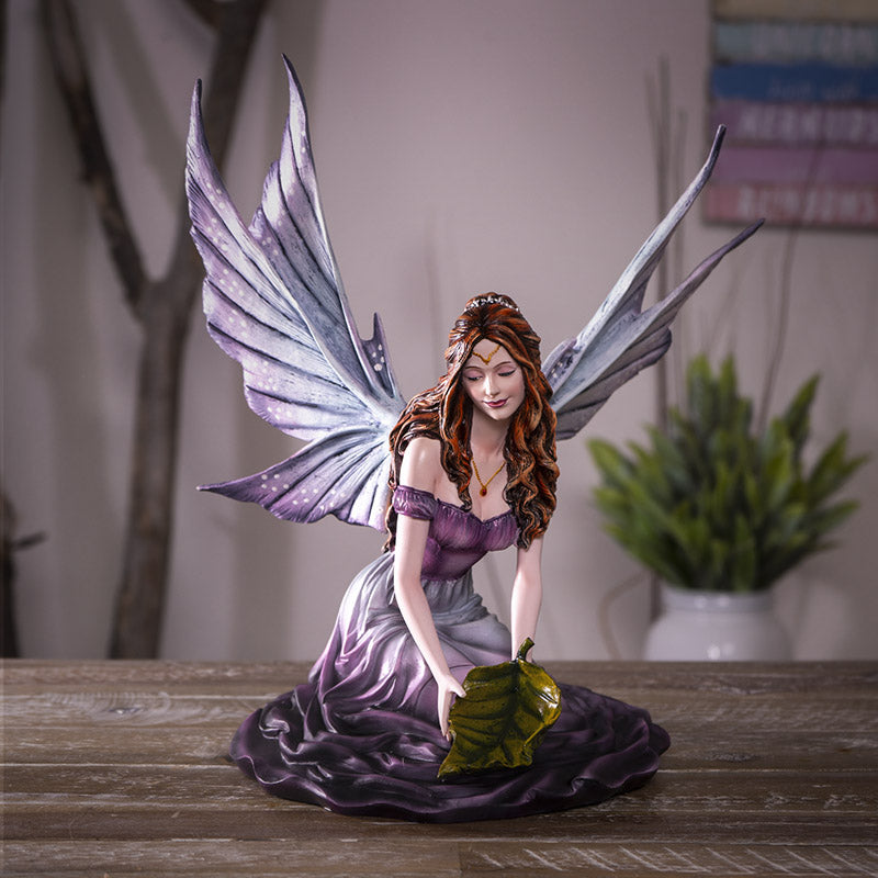 Fairy Playing With Leaf Statue