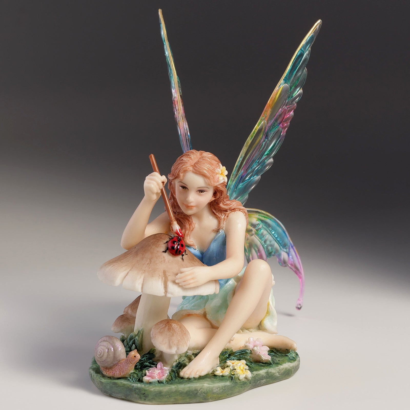 Chromatic Fairy Painting Lady Bug Statue