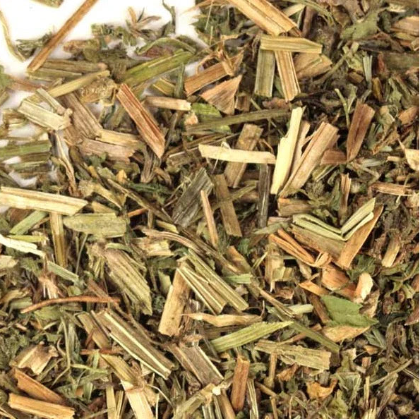 Dry herbs and leaves on a white background