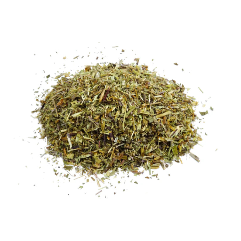 Pile of dried herbs on a white background