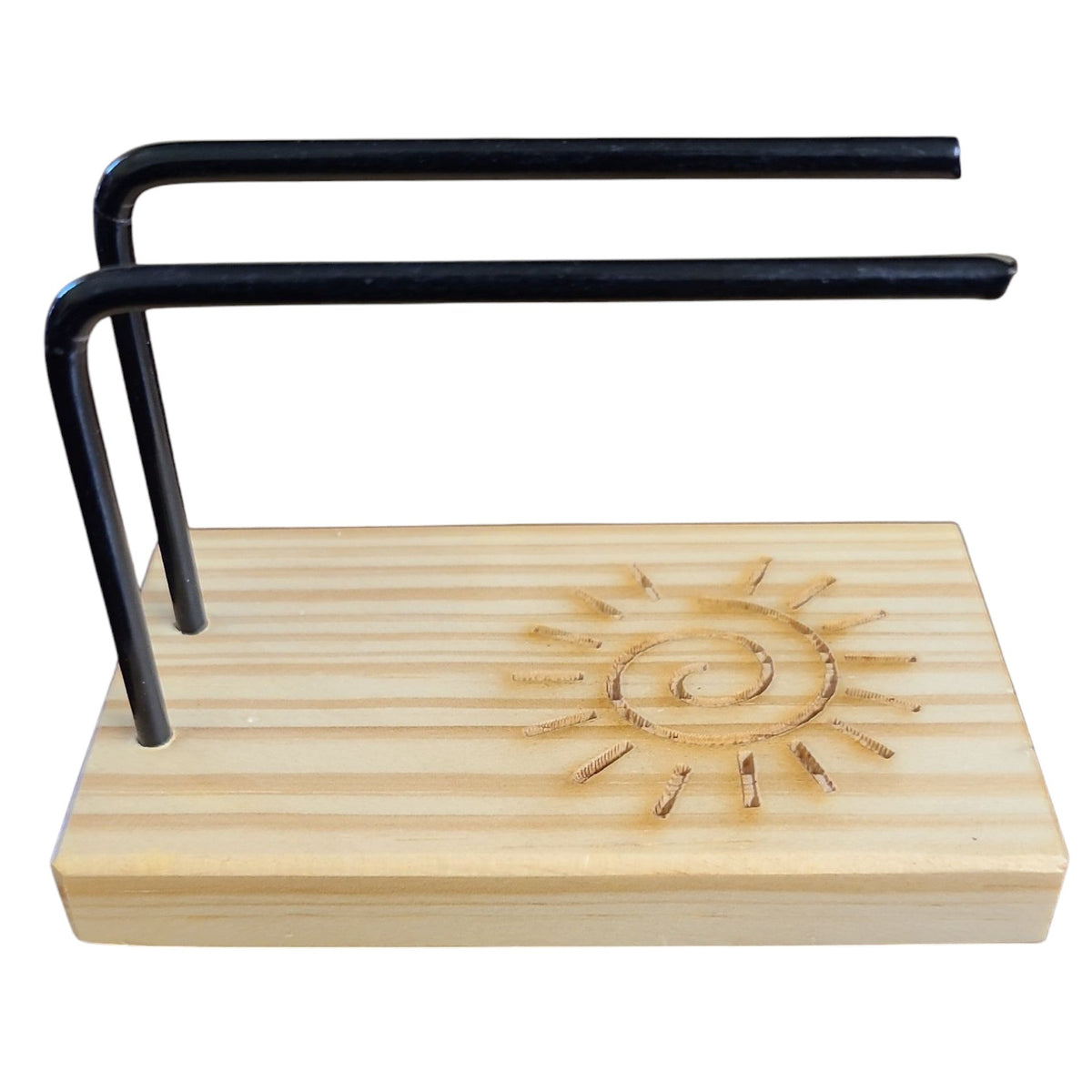 A wooden display stand with a light natural wood base featuring a laser-engraved sun design, supported by two black metal U-shaped brackets, shown against a plain white background.