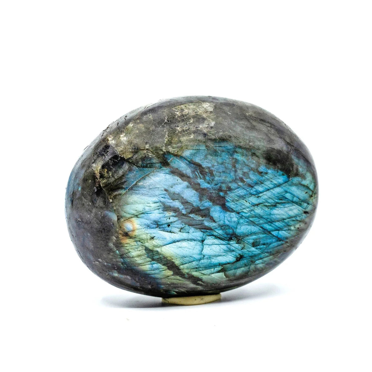 Labradorite stone on a white background
