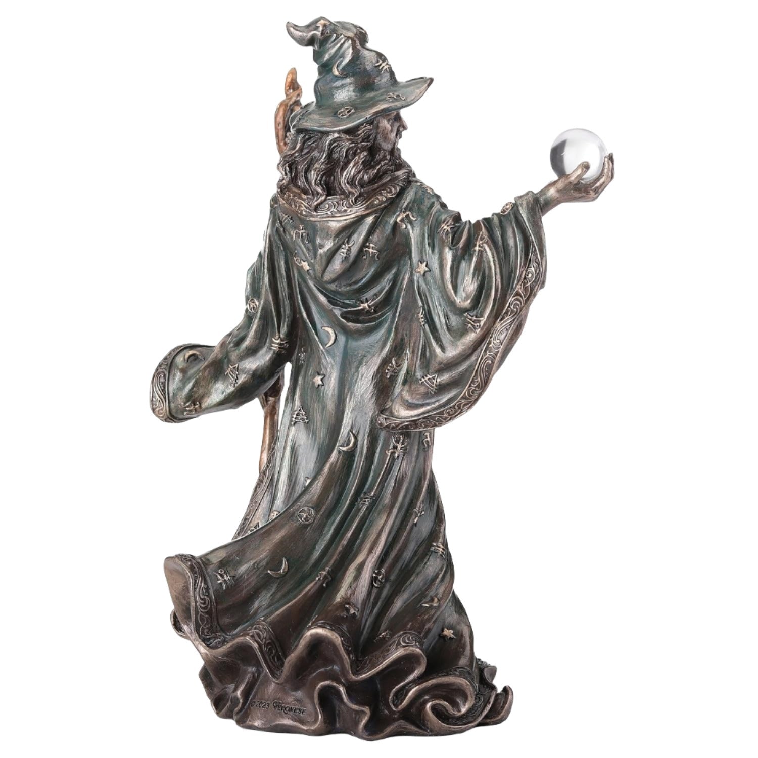 Wizard Holding Crystal Ball And
Staff