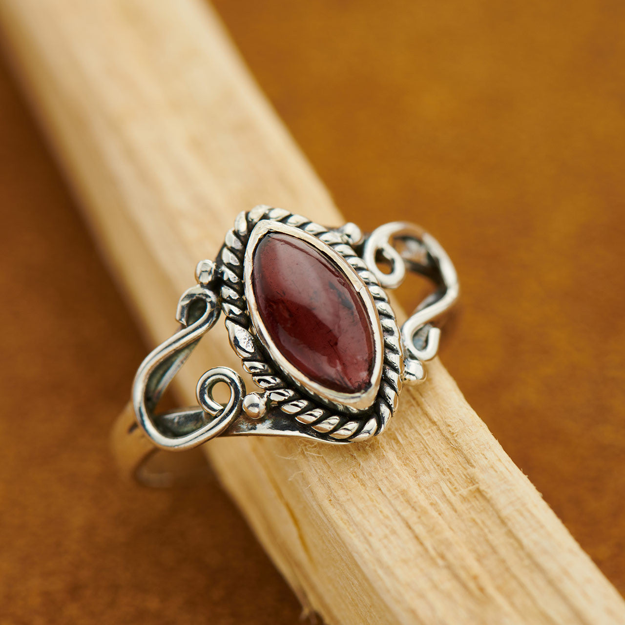 Garnet is a natural stone sourced primarily from the Czech Republic. It was used for centuries as a talisman to safeguard soldiers during battle. It is said to heal injuries, promote peace and offer protection to those who wear or carry it. As a gift it symbolizes loyalty.