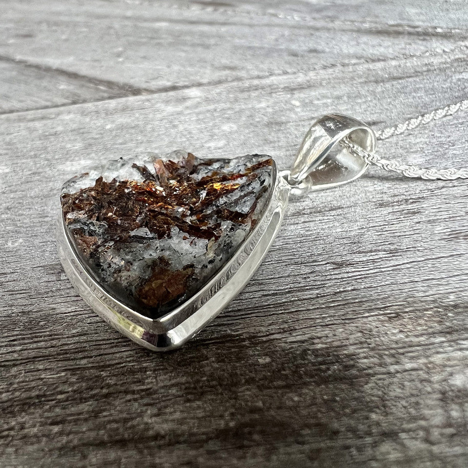 Astrophyllite is thought to compensate for our physical restrictions by expanding our spiritual perception of all things. It is a popular stone for those working on 'Astral Travel'. As Astrophyllite is a bridge for perception, it also activates the highest and lowest chakras, uniting each energy center along the way.