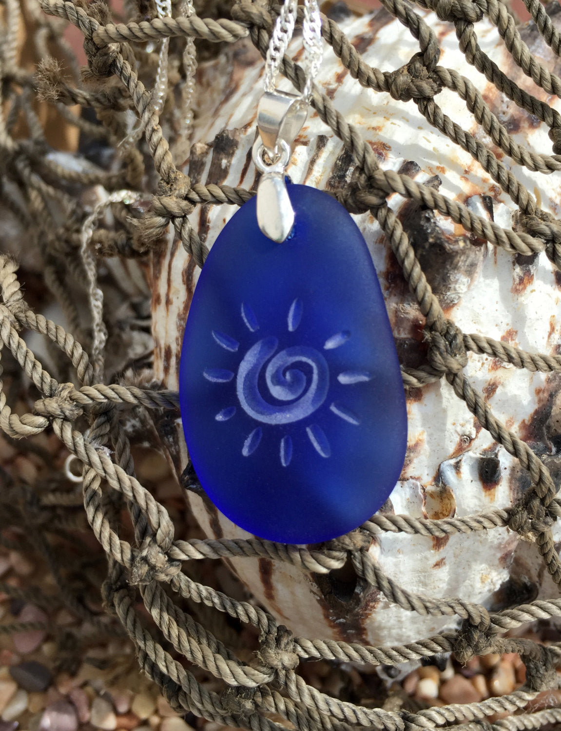 The Primitive Sun necklace - engraved Ocean beach Sea Glass Jewelry - choose your color - Cast a Stone