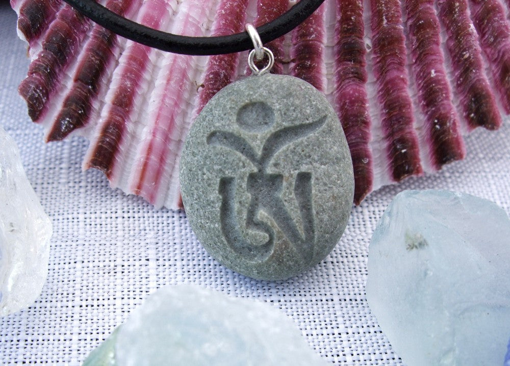 Tibetan Om symbol - engraved Beach Stone Pendant - Seed of Creation necklace - Cast a Stone