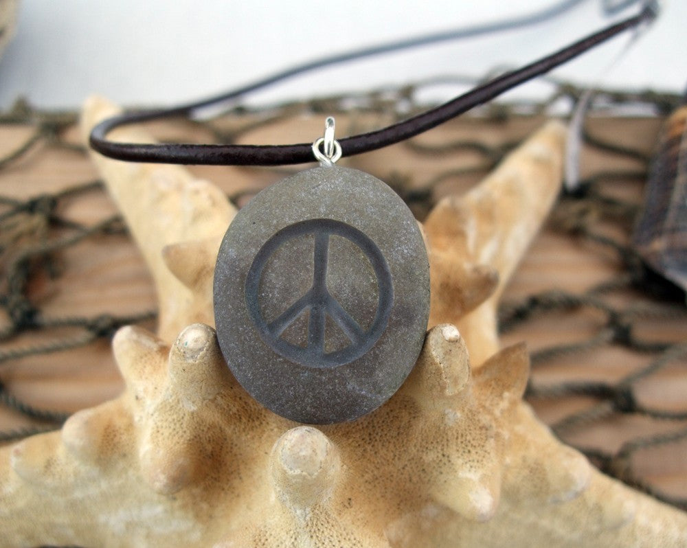 A sign of Peace - engraved Beach Stone Pendant - upcycled necklace - Cast a Stone