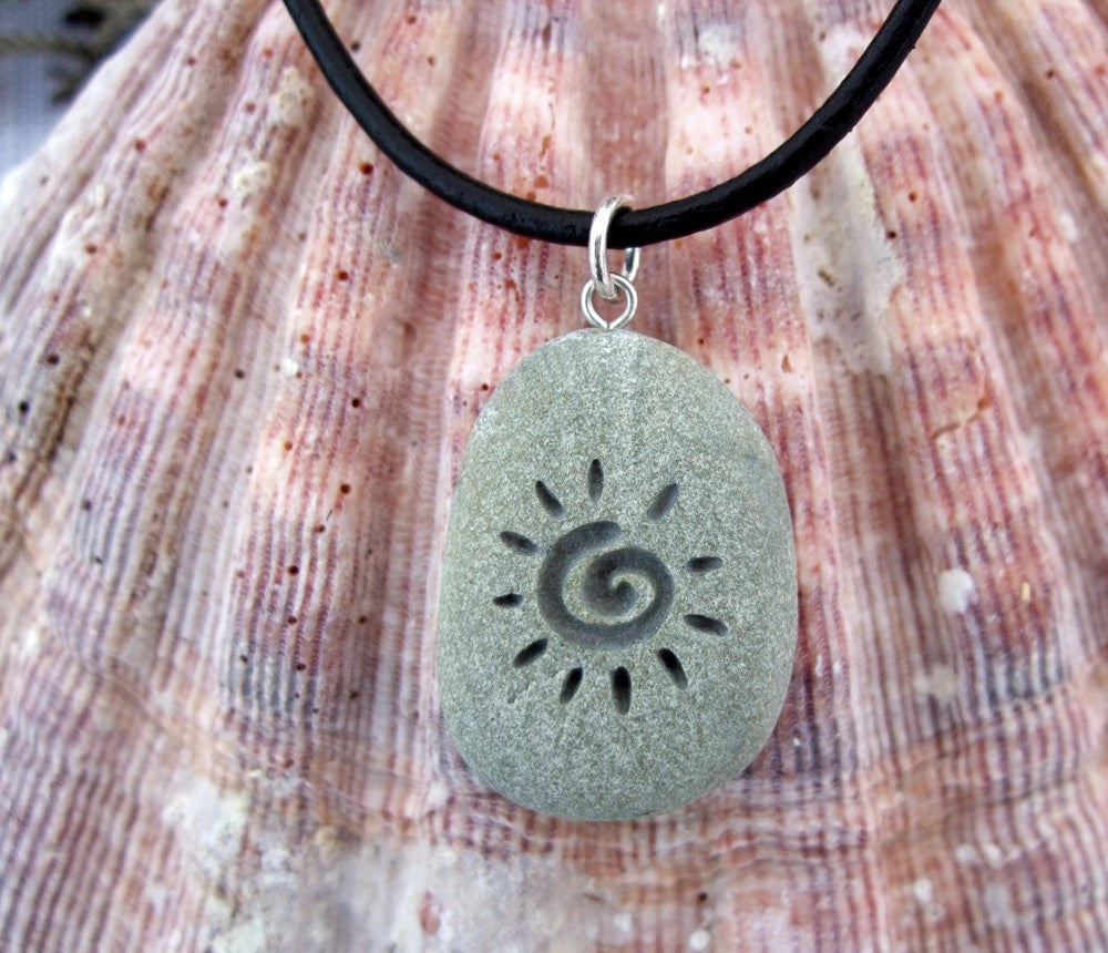 The Primitive Sun - deeply Engraved upcycled Beach Stone Pendant - Cast a Stone