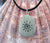The Primitive Sun - deeply Engraved upcycled Beach Stone Pendant Jewelry - Cast a Stone