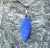 Treble Clef  symbol on Ice Blue beach Sea Glass pendant - Cast a Stone