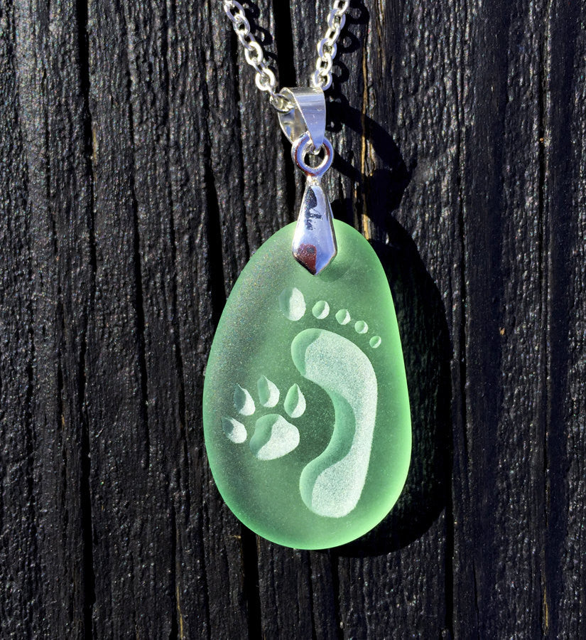 Footprint and Dog Paw Forever Friends engraved Sea Glass pendant Jewelry - choose your color - Cast a Stone