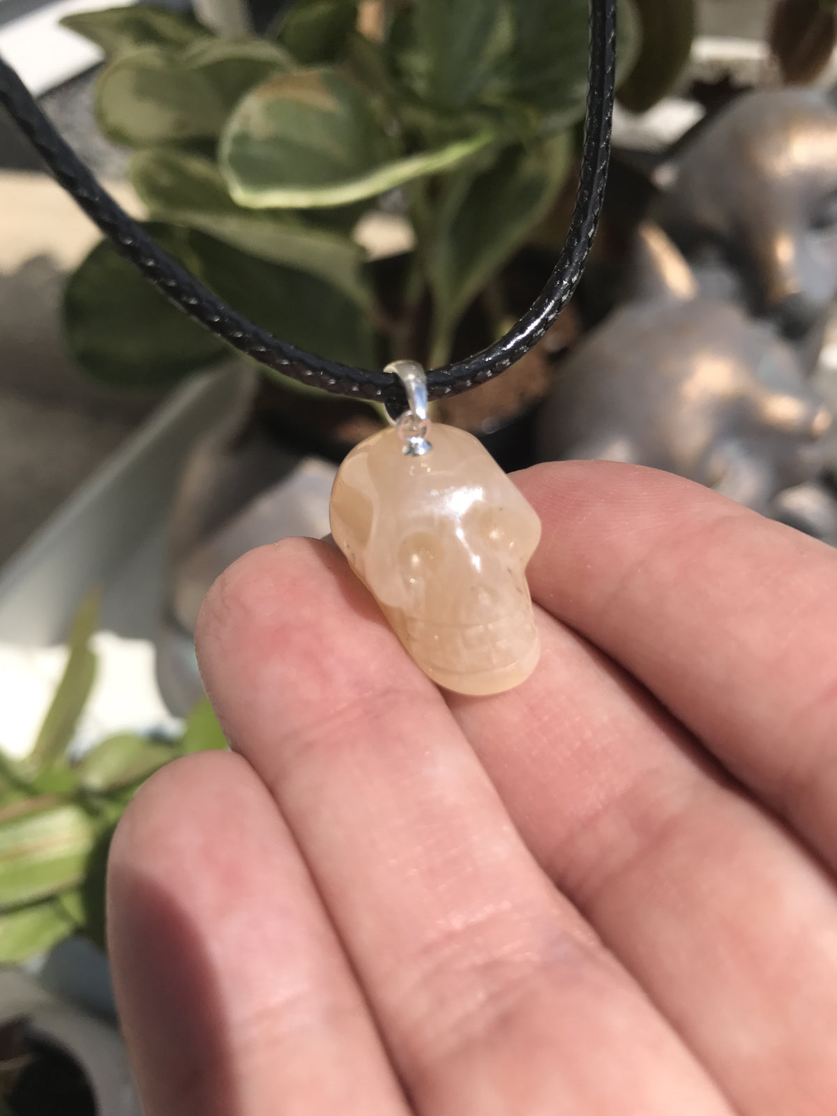Moonstone natural crystal skull pendant - Cast a Stone