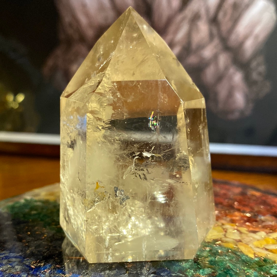 Polished Citrine Gemstone Point with natural inclusions visible