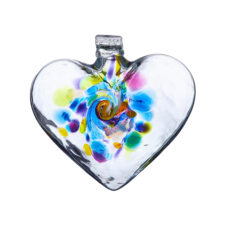 “May this heart awaken a desire to reflect on all that is good and allow me to reflect that light back to those whom I love and are close to me.” Intention leads us each down our own path of discovery and experimentation. This heart features a story that is self-reflective and crafted with a swirl of glass in the center.