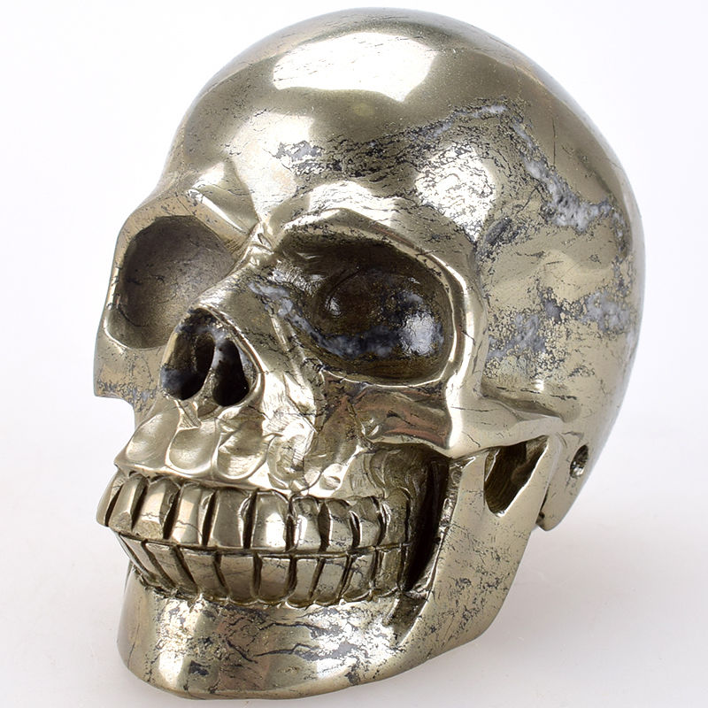 Pyrite carved natural Crystal Skull - Cast a Stone